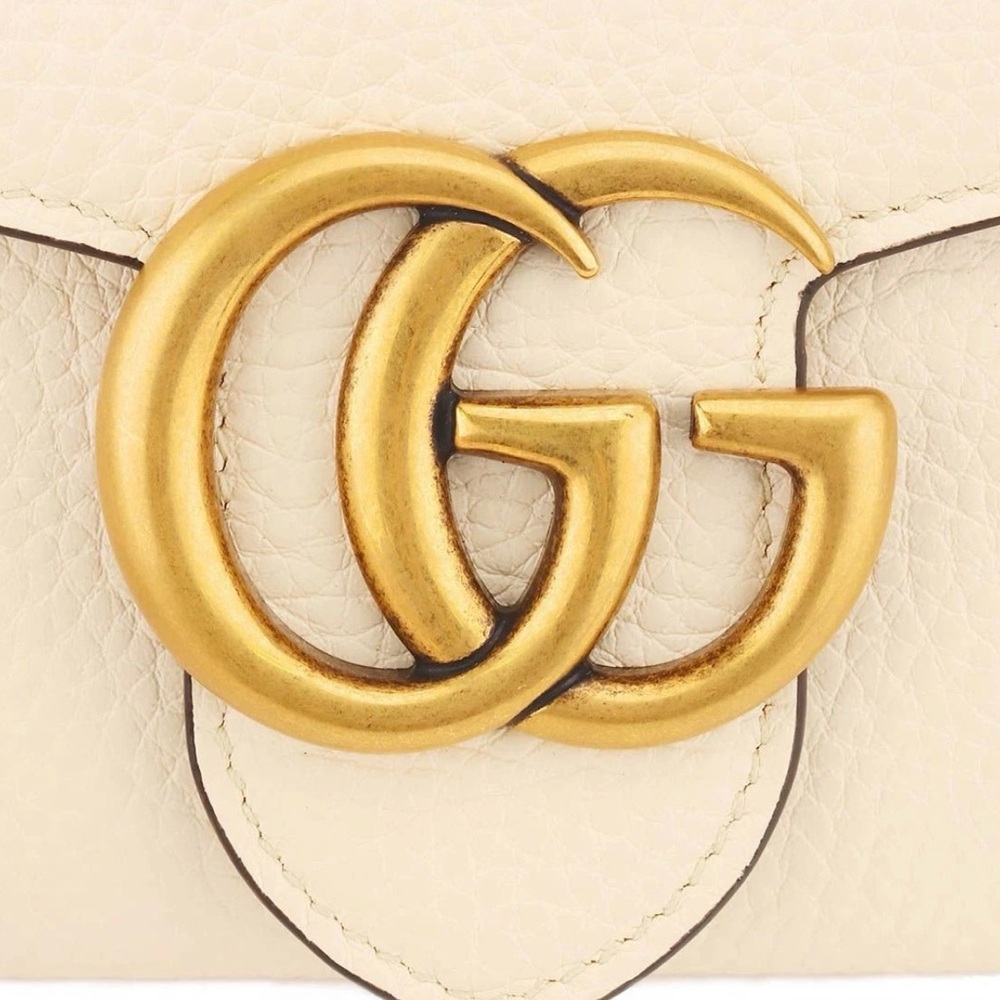 Gucci Ivory Leather Clutch with Gold GG Logo 779776 A7M0T 9522 model